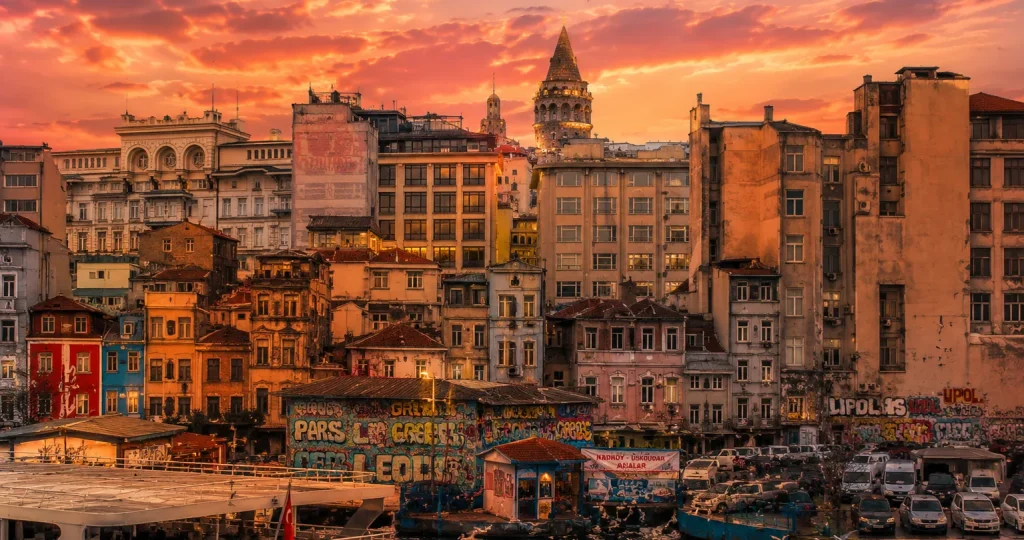 Golden hour view of Galata Tower and the Karaköy waterfront in Istanbul